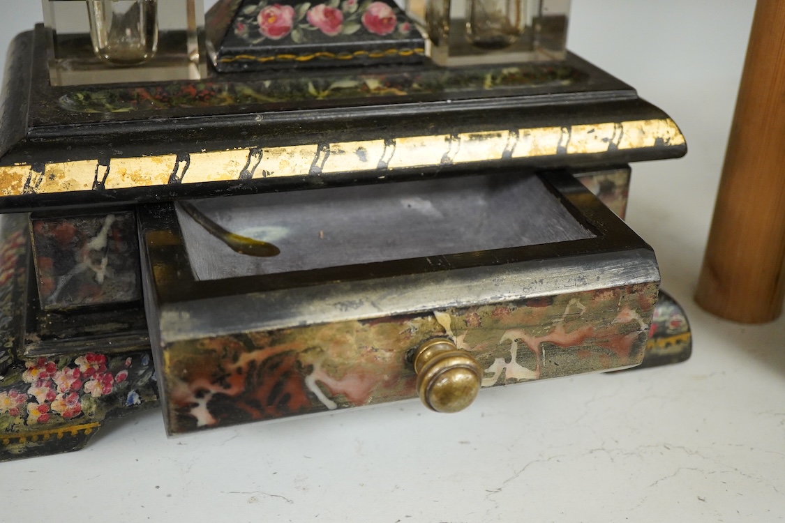 A 19th century painted black slate desk stand with two glass ink wells, 30cm wide